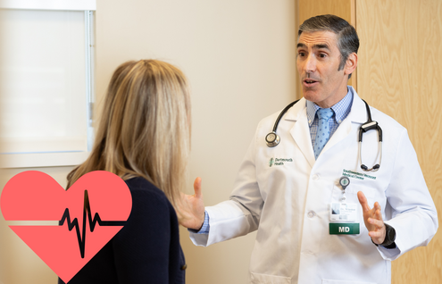 Brion Winston, MD talks with a patient 